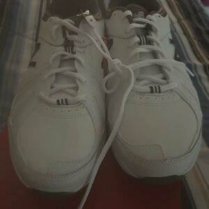 New in box Mens New Balance 519 shoes. These are 11.5 4 extra wide.